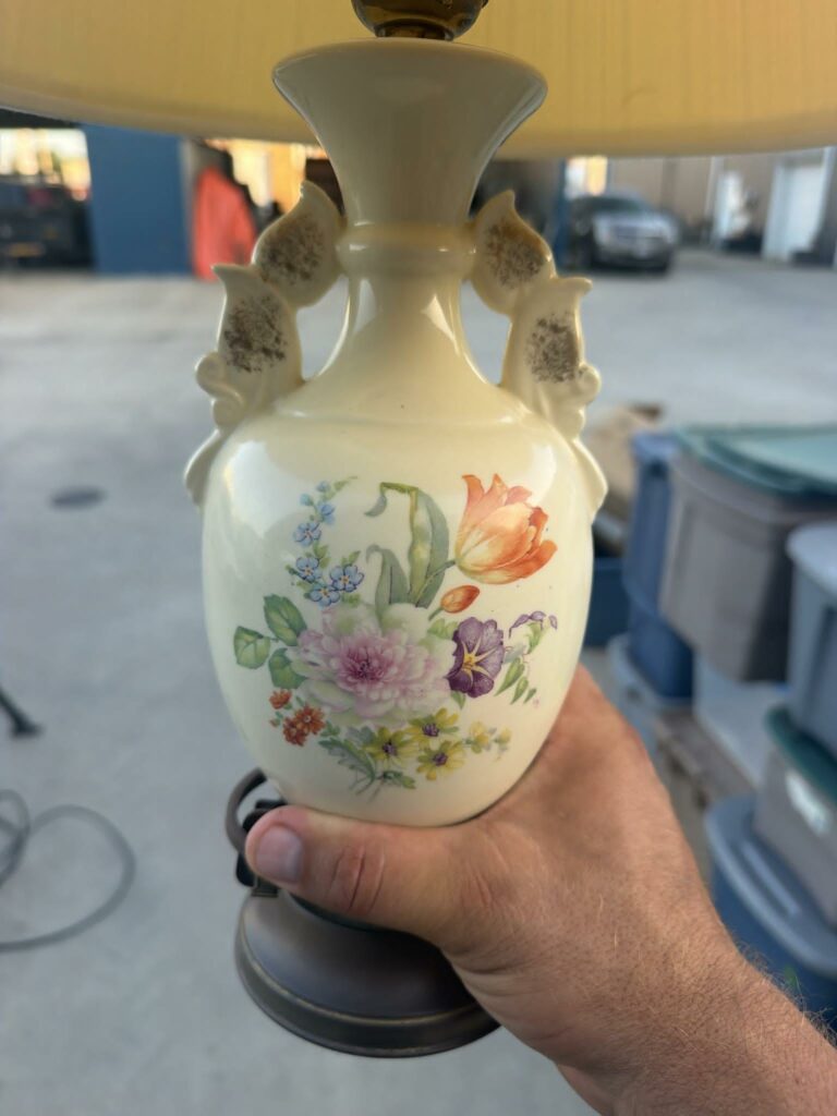 Antique furniture and collectibles displayed for an estate sale